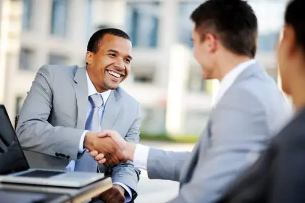 Salesman shaking hands
