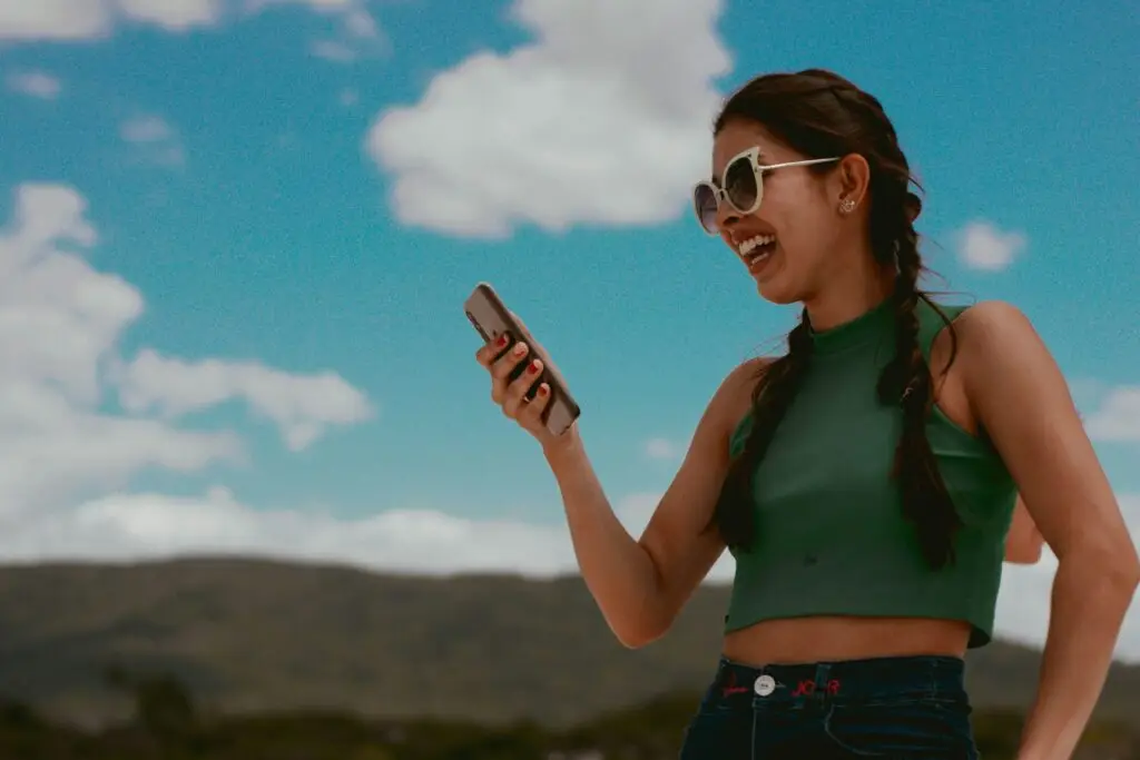 woman on mobile phone looking at social media